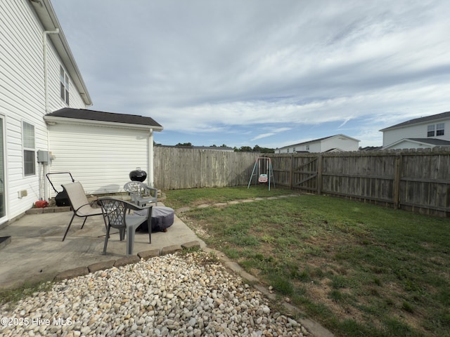 141 Jessie Cir, Hubert, NC 28539 - fenced backyard featuring a patio