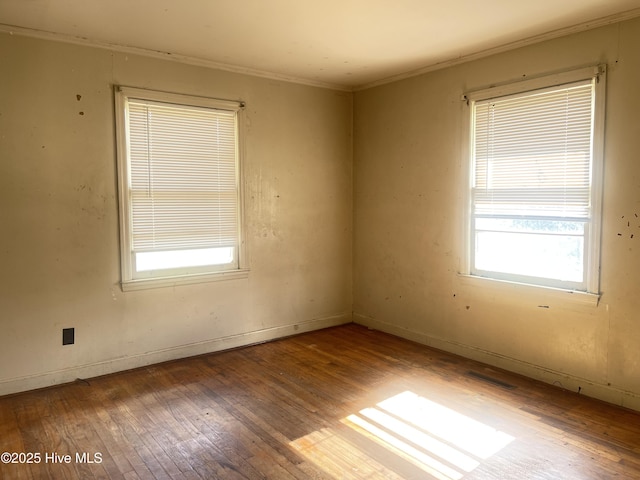 2023 NC-211 Hwy, Eagle Springs, NC 27242 - empty room with wood-type flooring, ornamental molding, and baseboards