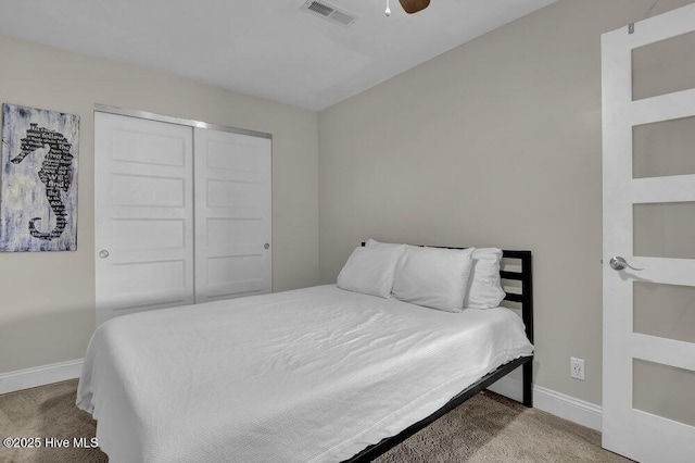 323 Cape Fear Blvd, Wilmington, NC 28401 - bedroom with baseboards, carpet, a closet, and a ceiling fan