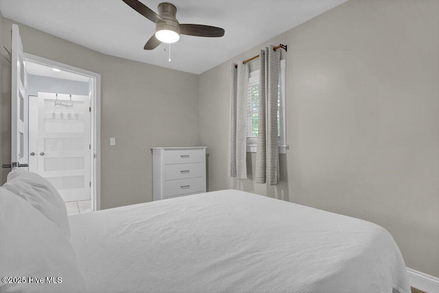 323 Cape Fear Blvd, Wilmington, NC 28401 - bedroom featuring ensuite bathroom, ceiling fan, and baseboards