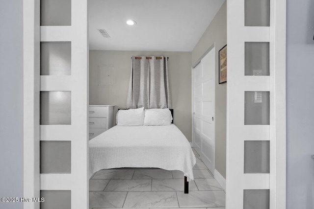323 Cape Fear Blvd, Wilmington, NC 28401 - bedroom with marble finish flooring, recessed lighting, and baseboards