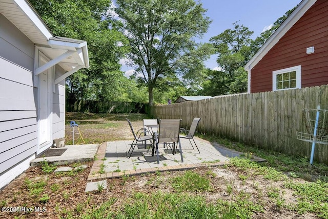 323 Cape Fear Blvd, Wilmington, NC 28401 - fenced backyard featuring a patio