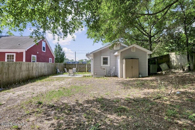 323 Cape Fear Blvd, Wilmington, NC 28401 - fenced backyard with a patio