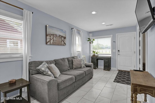 323 Cape Fear Blvd, Wilmington, NC 28401 - living area with light marble finish flooring and recessed lighting