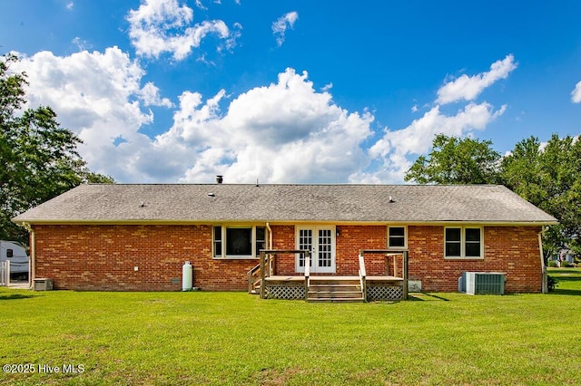 4909 Creekside Dr, New Bern, NC 28562 - back of property featuring a deck, cooling unit, french doors, a yard, and brick siding