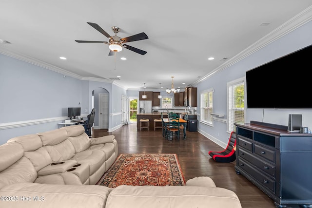 266 Marsh Haven Dr, Sneads Ferry, NC 28460 - living room with a ceiling fan, recessed lighting, dark wood-style flooring, crown molding, and a chandelier