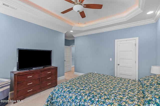 266 Marsh Haven Dr, Sneads Ferry, NC 28460 - bedroom with a tray ceiling, light colored carpet, crown molding, recessed lighting, and a ceiling fan