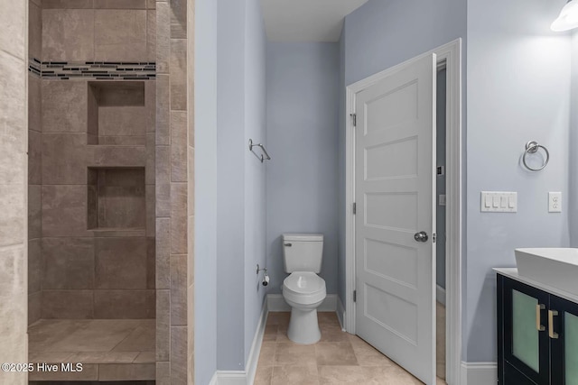 266 Marsh Haven Dr, Sneads Ferry, NC 28460 - full bath featuring a tile shower, toilet, tile patterned floors, and baseboards