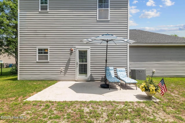 266 Marsh Haven Dr, Sneads Ferry, NC 28460 - rear view of house with central air condition unit and a patio