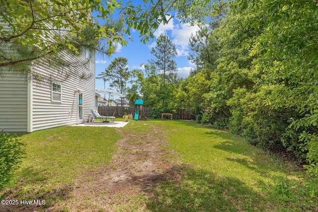 266 Marsh Haven Dr, Sneads Ferry, NC 28460 - view of yard with a patio area and a playground