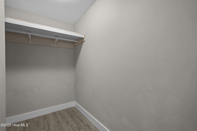 120 NW 19th St, Oak Island, NC 28465 - spacious closet with wood finished floors