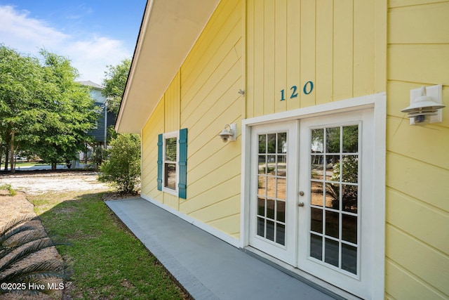 120 NW 19th St, Oak Island, NC 28465 - entrance to property with french doors