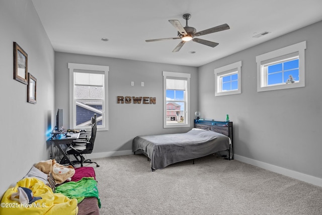 601 Trawler Pl, Newport, NC 28570 - bedroom with baseboards, carpet floors, and a ceiling fan