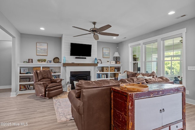 601 Trawler Pl, Newport, NC 28570 - living area with a ceiling fan, baseboards, light wood-style flooring, and recessed lighting