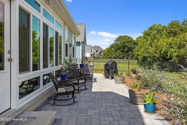 601 Trawler Pl, Newport, NC 28570 - fenced backyard with a patio and a grill