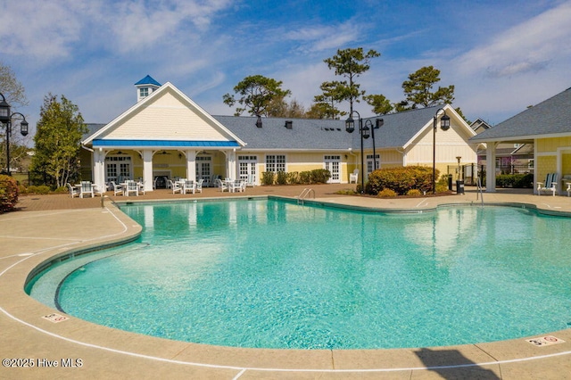 601 Trawler Pl, Newport, NC 28570 - community pool with a patio and french doors