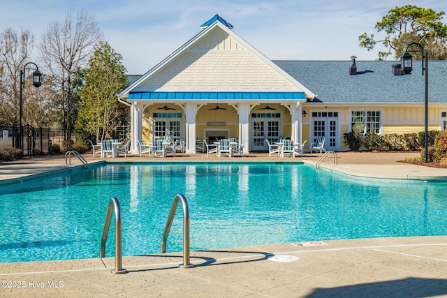 601 Trawler Pl, Newport, NC 28570 - community pool featuring french doors, a ceiling fan, and a patio