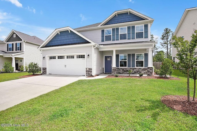2610 Longleaf Pine Cir, Leland, NC 28451 - craftsman-style house featuring stone siding, a garage, concrete driveway, and a porch