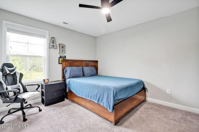 2610 Longleaf Pine Cir, Leland, NC 28451 - bedroom featuring carpet flooring, baseboards, and ceiling fan