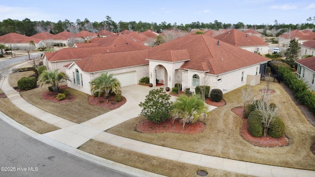 2215 Villamar Dr, Leland, NC 28451 - view of front of property featuring driveway, a garage, roof with shingles, and a residential view