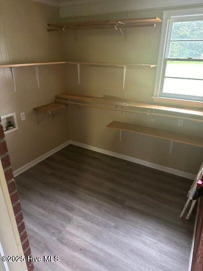302 N Main St, Robersonville, NC 27871 - spacious closet featuring wood finished floors