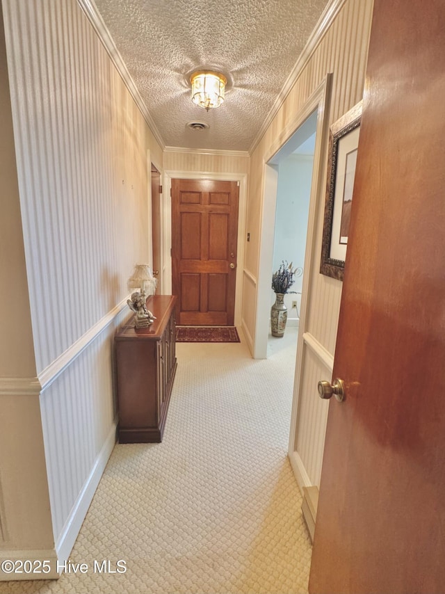 2140 Joe Temple St, Kinston, NC 28504 - hallway featuring crown molding and a textured ceiling