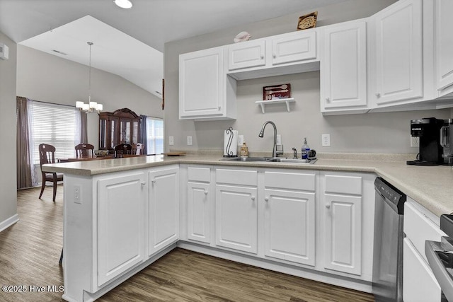 7475 Thais Trl, Wilmington, NC 28411 - kitchen featuring a sink, stainless steel dishwasher, vaulted ceiling, a chandelier, and white cabinetry