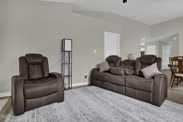 7475 Thais Trl, Wilmington, NC 28411 - living room with wood finished floors, lofted ceiling, and baseboards