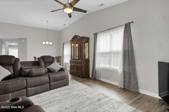 7475 Thais Trl, Wilmington, NC 28411 - living area with a ceiling fan, a chandelier, lofted ceiling, wood finished floors, and baseboards