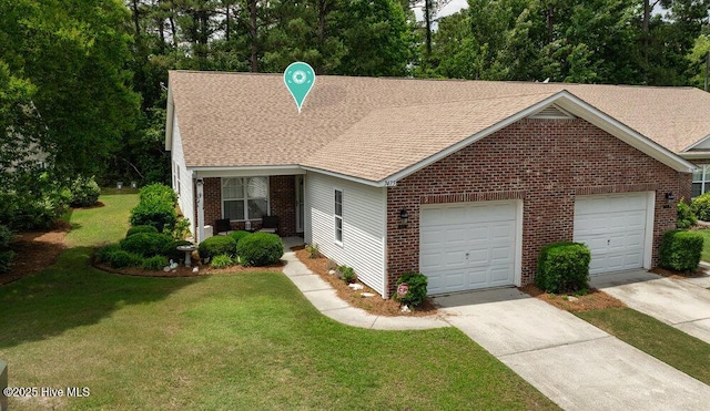 7475 Thais Trl, Wilmington, NC 28411 - view of front facade featuring concrete driveway, brick siding, a shingled roof, a front yard, and a garage