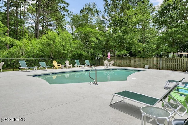 7475 Thais Trl, Wilmington, NC 28411 - community pool featuring a patio and view of scattered trees
