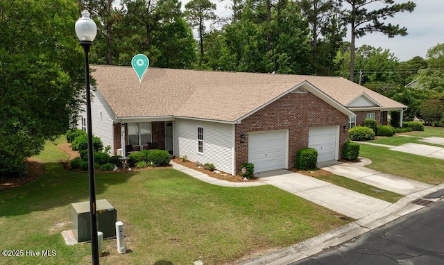 7475 Thais Trl, Wilmington, NC 28411 - view of front facade with an attached garage, driveway, a front lawn, and brick siding