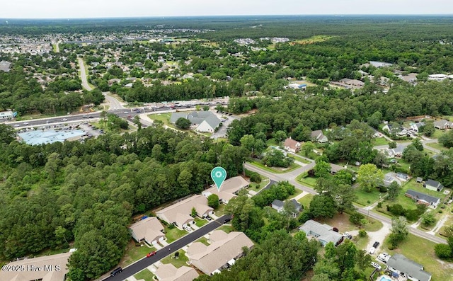 7475 Thais Trl, Wilmington, NC 28411 - aerial perspective of suburban area featuring a heavily wooded area