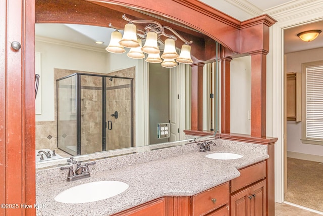 bathroom with ornamental molding, a shower stall, double vanity, a chandelier, and tile patterned flooring