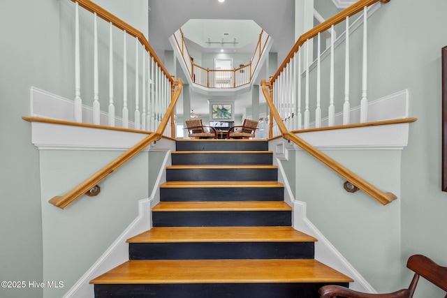 208 Sea Manor Dr, Surf City, NC 28445 - stairs featuring a towering ceiling