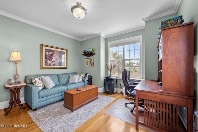 208 Sea Manor Dr, Surf City, NC 28445 - office area featuring crown molding, light wood finished floors, and baseboards