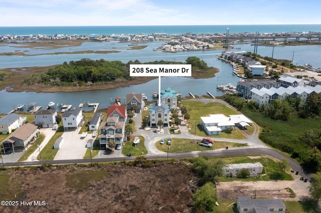 208 Sea Manor Dr, Surf City, NC 28445 - aerial overview of property's location featuring a large body of water and nearby suburban area