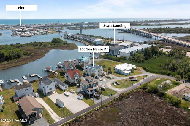 208 Sea Manor Dr, Surf City, NC 28445 - view of property location with a nearby body of water and a notable bridge