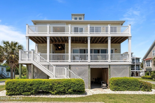 208 Sea Manor Dr, Surf City, NC 28445 - back of property with covered porch and stairs