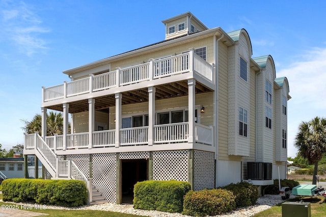 208 Sea Manor Dr, Surf City, NC 28445 - back of house with stairway