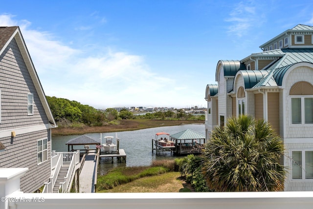 208 Sea Manor Dr, Surf City, NC 28445 - dock area featuring boat lift and a water view