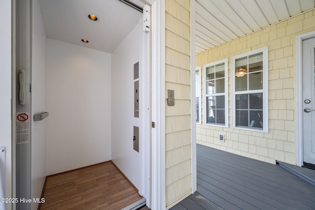 208 Sea Manor Dr, Surf City, NC 28445 - view of exterior entry with elevator and a porch