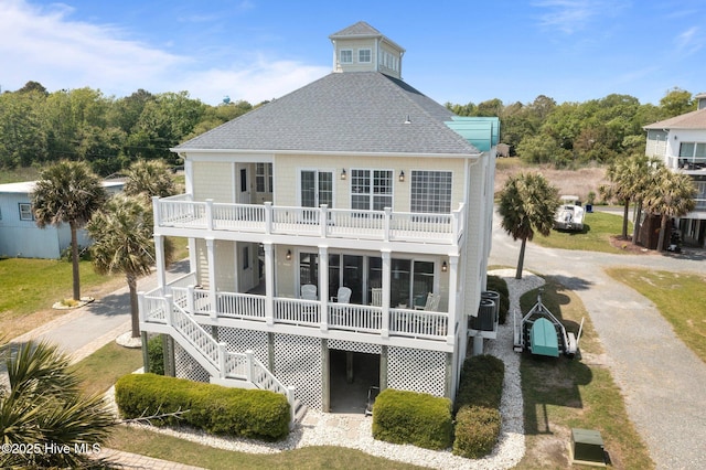 208 Sea Manor Dr, Surf City, NC 28445 - back of property featuring roof with shingles, a balcony, stairway, a porch, and central air condition unit