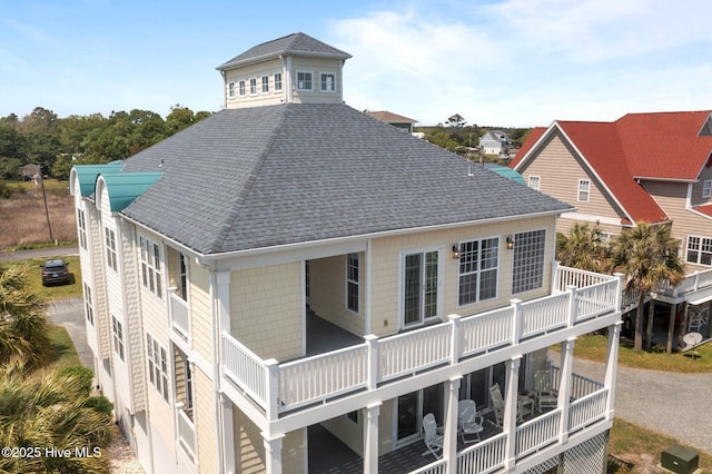 208 Sea Manor Dr, Surf City, NC 28445 - rear view of house featuring a shingled roof