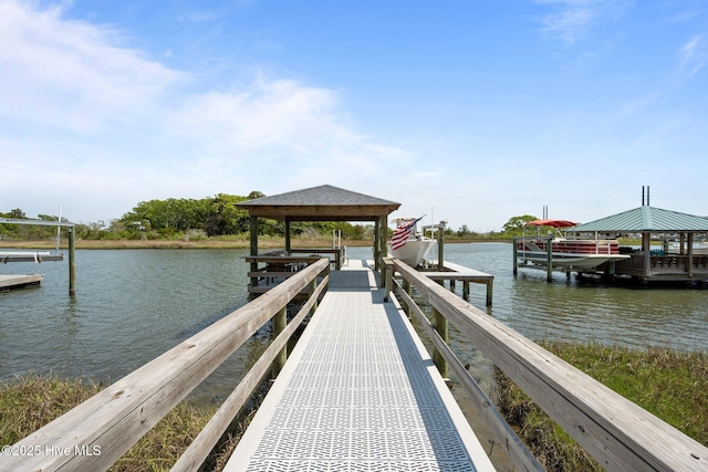 208 Sea Manor Dr, Surf City, NC 28445 - dock featuring boat lift and a water view