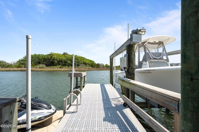 208 Sea Manor Dr, Surf City, NC 28445 - dock featuring boat lift and a water view
