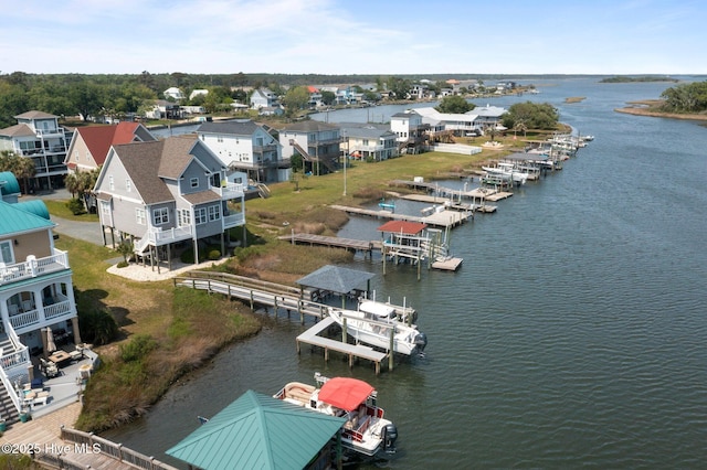208 Sea Manor Dr, Surf City, NC 28445 - aerial view of residential area featuring a large body of water
