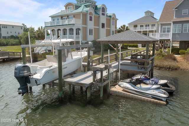 208 Sea Manor Dr, Surf City, NC 28445 - dock area with boat lift, a water view, and a gazebo
