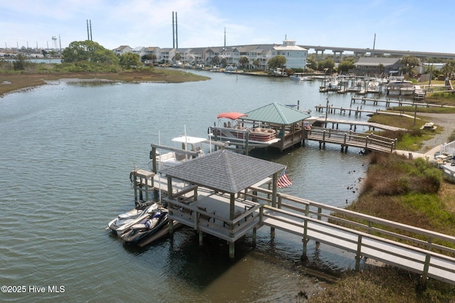 208 Sea Manor Dr, Surf City, NC 28445 - dock area featuring boat lift and a water view