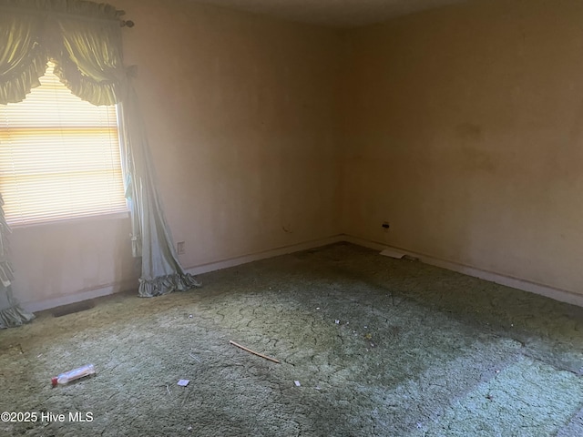691 Wade Daughtry Rd, Faison, NC 28341 - carpeted spare room with baseboards